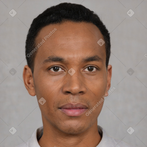 Neutral latino young-adult male with short  black hair and brown eyes