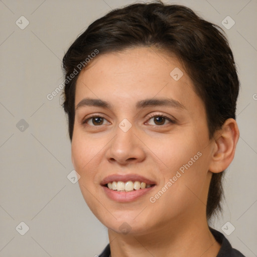 Joyful white young-adult female with medium  brown hair and brown eyes