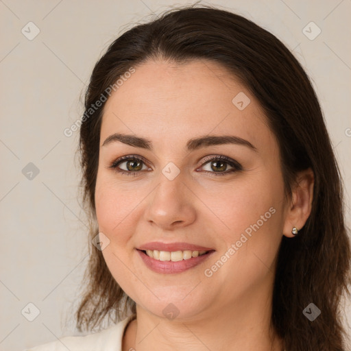 Joyful white young-adult female with medium  brown hair and brown eyes