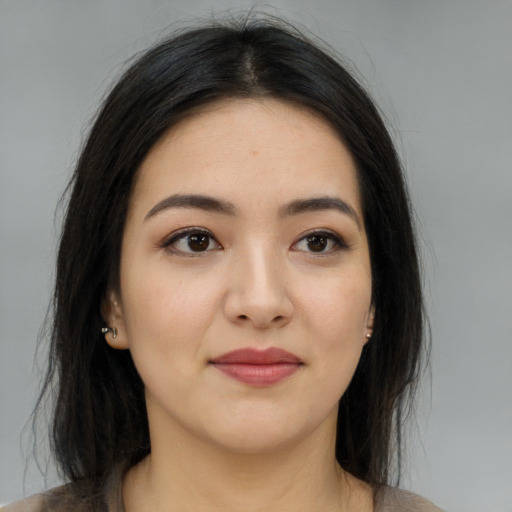 Neutral asian young-adult female with long  brown hair and brown eyes