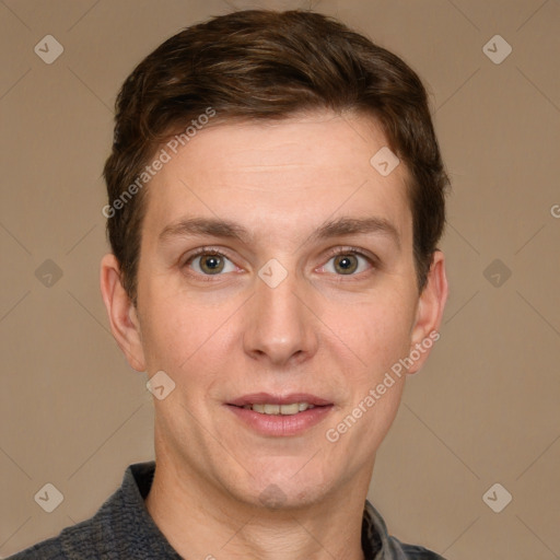 Joyful white adult male with short  brown hair and grey eyes