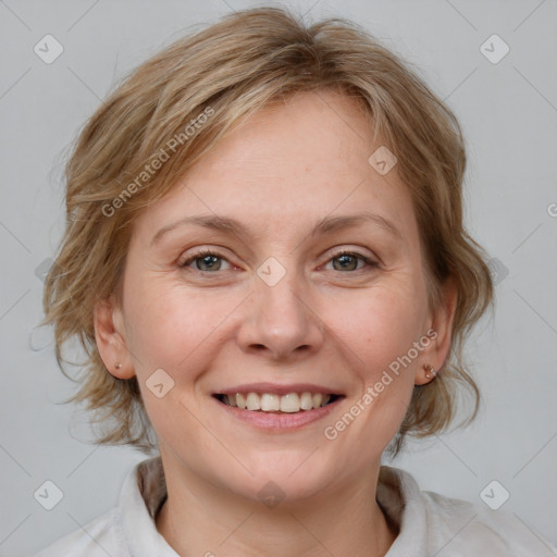 Joyful white young-adult female with medium  brown hair and blue eyes