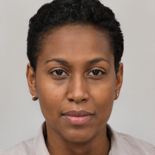 Neutral black young-adult female with short  black hair and brown eyes