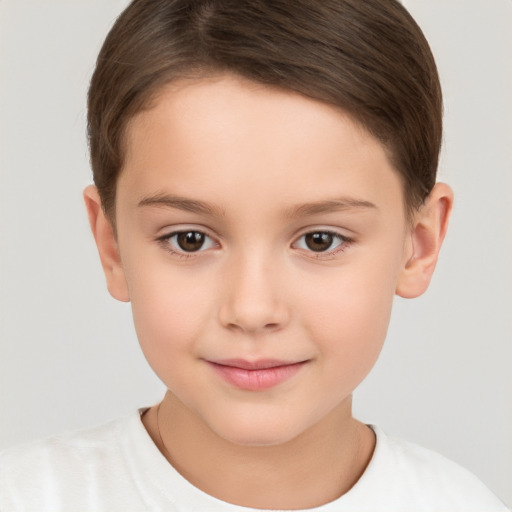 Joyful white child female with short  brown hair and brown eyes