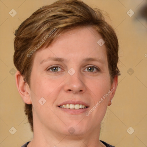 Joyful white adult female with short  brown hair and grey eyes