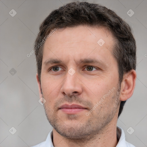 Neutral white adult male with short  brown hair and brown eyes