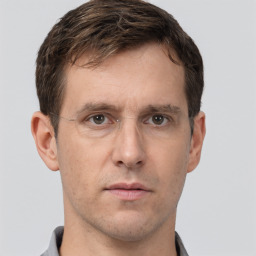 Neutral white adult male with short  brown hair and brown eyes