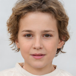 Joyful white child female with short  brown hair and brown eyes