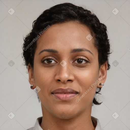 Joyful black young-adult female with short  brown hair and brown eyes