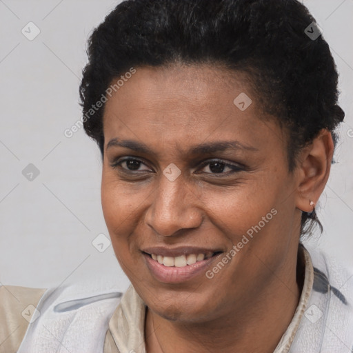 Joyful latino young-adult female with short  brown hair and brown eyes