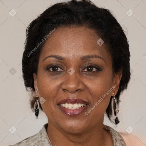 Joyful black adult female with medium  brown hair and brown eyes