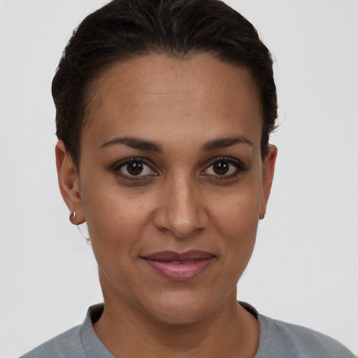 Joyful white young-adult female with short  brown hair and brown eyes