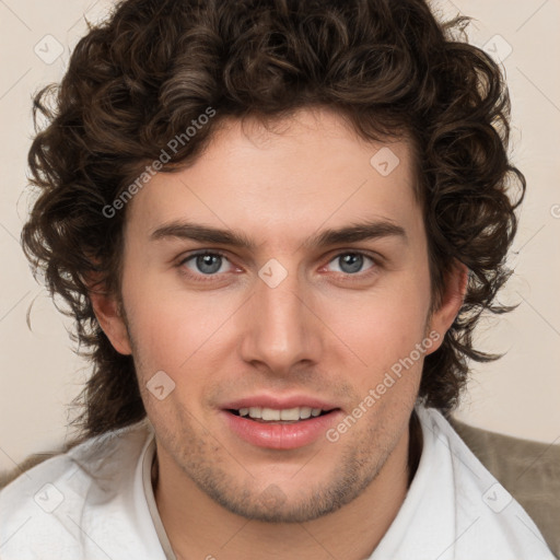 Joyful white young-adult male with medium  brown hair and brown eyes