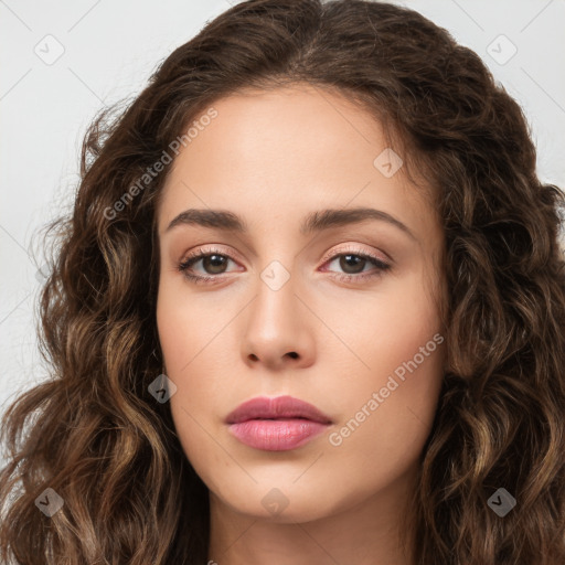 Neutral white young-adult female with long  brown hair and brown eyes