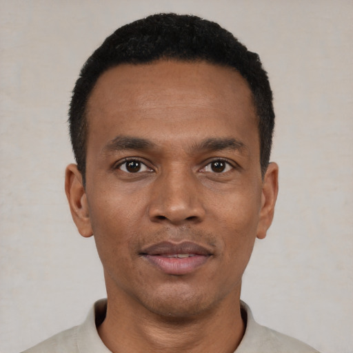 Neutral black young-adult male with short  black hair and brown eyes