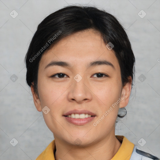 Joyful asian young-adult female with short  black hair and brown eyes