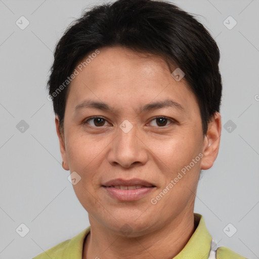 Joyful white adult female with short  brown hair and brown eyes