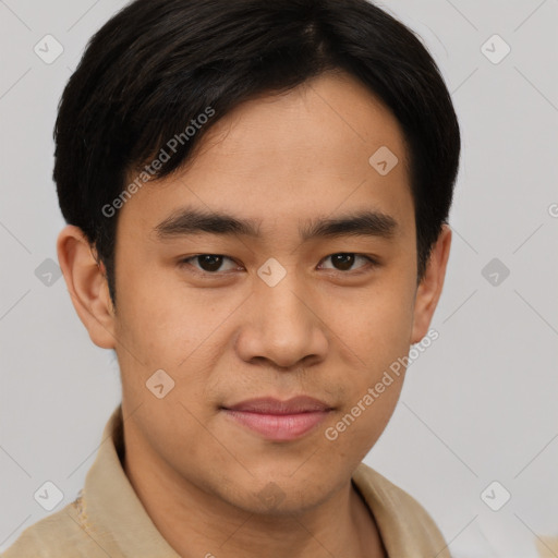 Joyful asian young-adult male with short  brown hair and brown eyes