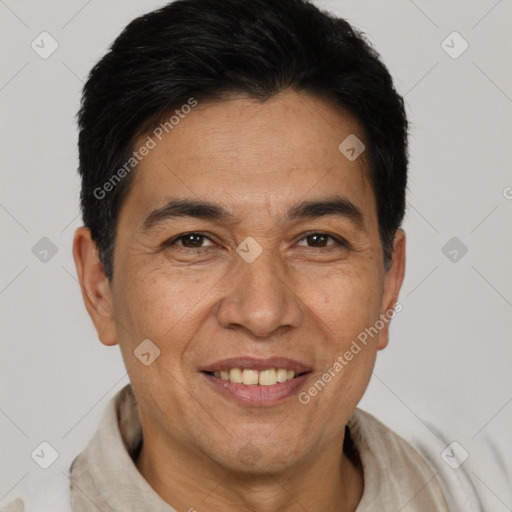 Joyful white adult male with short  brown hair and brown eyes