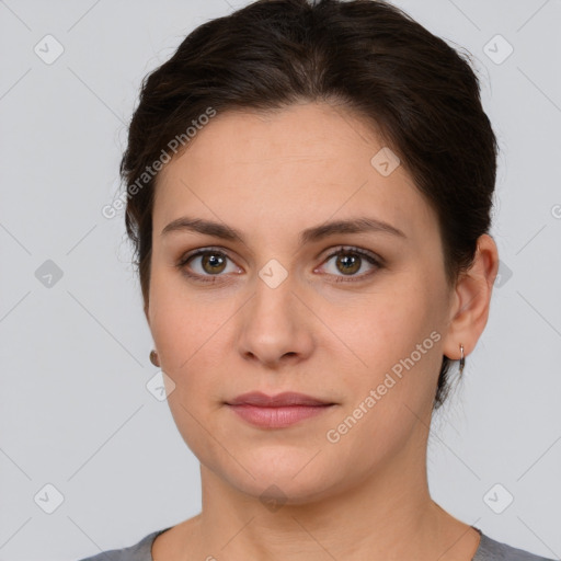 Neutral white young-adult female with short  brown hair and brown eyes