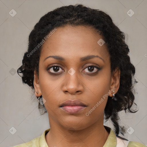 Neutral black young-adult female with medium  brown hair and brown eyes