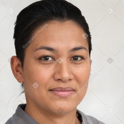 Joyful latino young-adult female with short  brown hair and brown eyes