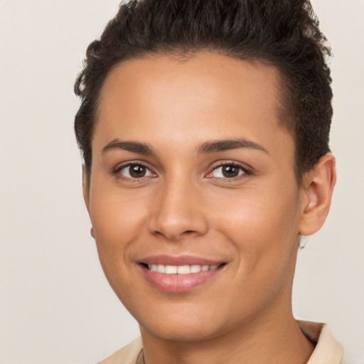 Joyful white young-adult female with short  brown hair and brown eyes