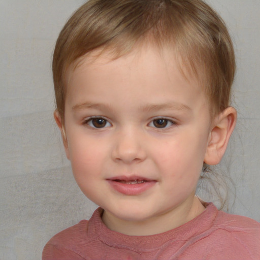 Joyful white child male with short  brown hair and brown eyes