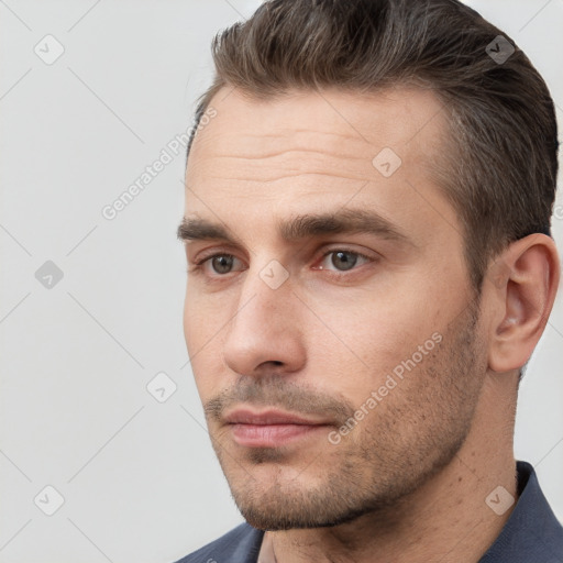 Neutral white young-adult male with short  brown hair and brown eyes