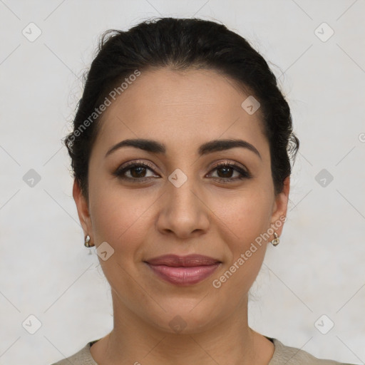 Joyful latino young-adult female with short  brown hair and brown eyes