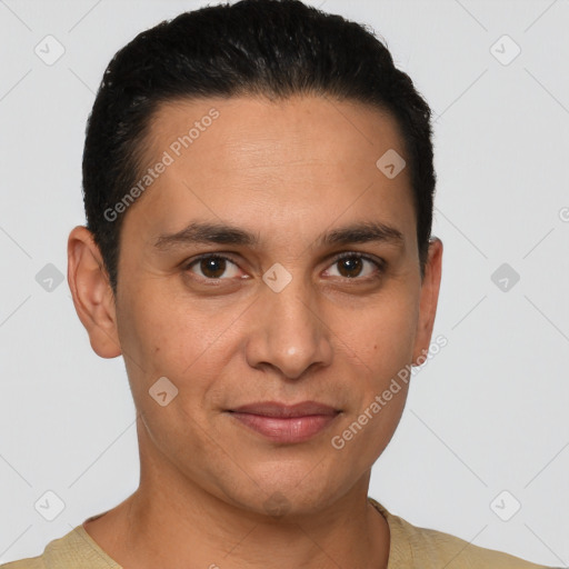 Joyful latino young-adult male with short  brown hair and brown eyes