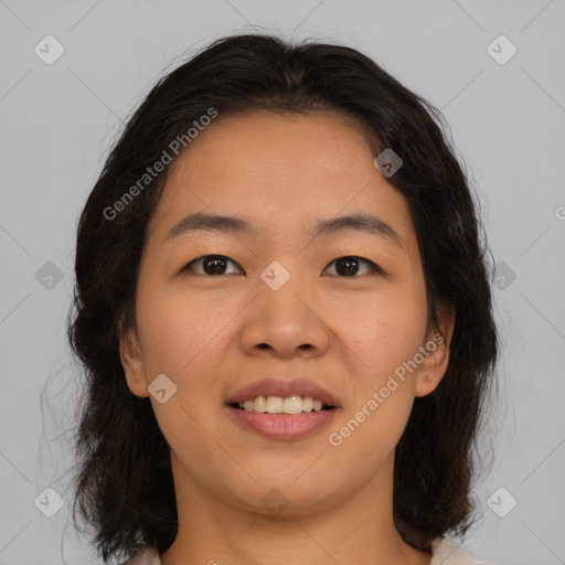 Joyful asian young-adult female with medium  brown hair and brown eyes