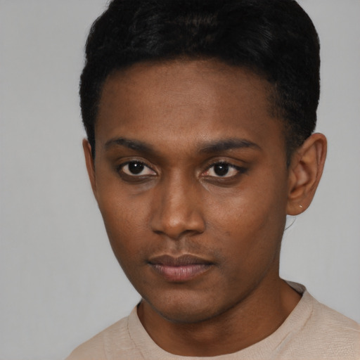 Neutral black young-adult male with short  black hair and brown eyes
