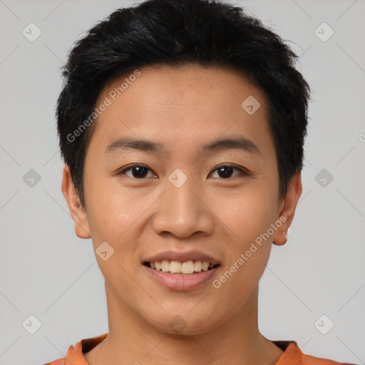 Joyful asian young-adult male with short  black hair and brown eyes