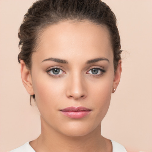 Neutral white young-adult female with short  brown hair and brown eyes