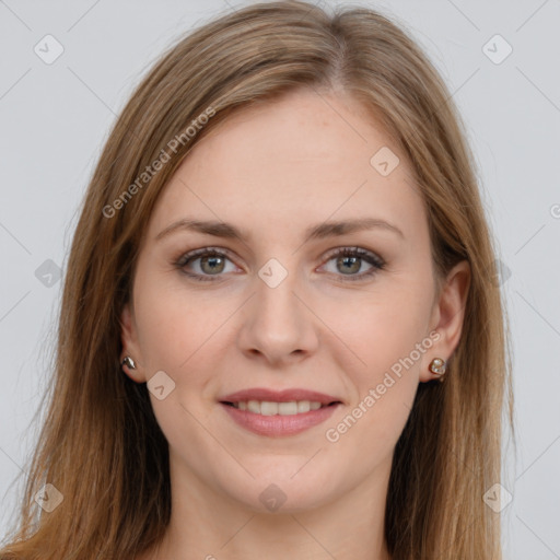 Joyful white young-adult female with long  brown hair and grey eyes