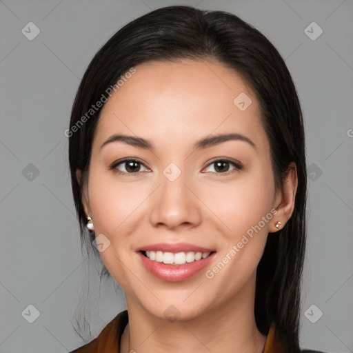 Joyful white young-adult female with long  black hair and brown eyes