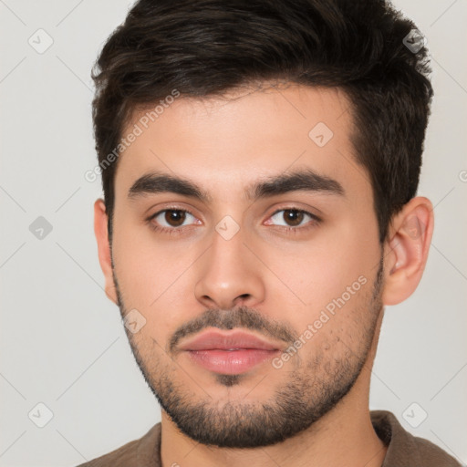 Neutral white young-adult male with short  brown hair and brown eyes