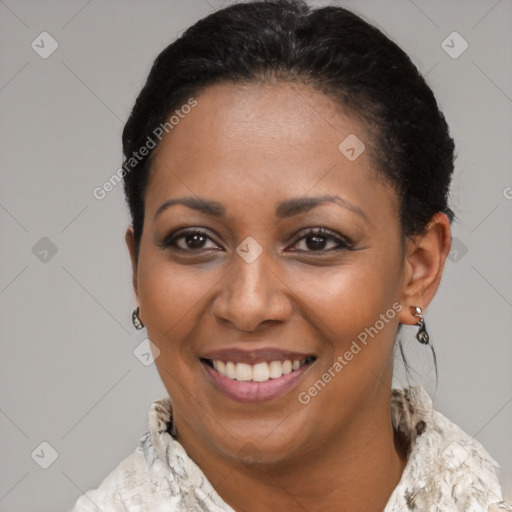 Joyful latino young-adult female with short  brown hair and brown eyes