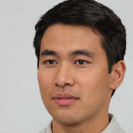 Neutral asian young-adult male with short  black hair and brown eyes