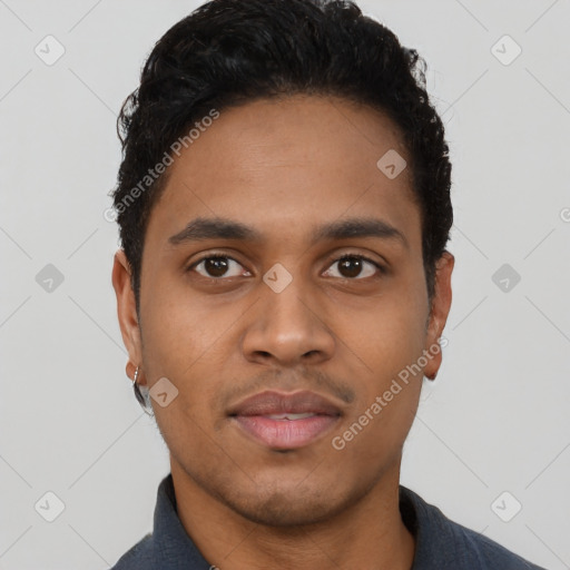 Neutral latino young-adult male with short  black hair and brown eyes