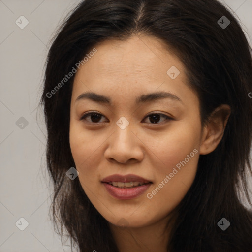 Joyful asian young-adult female with long  brown hair and brown eyes