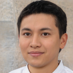 Joyful asian young-adult male with short  black hair and brown eyes