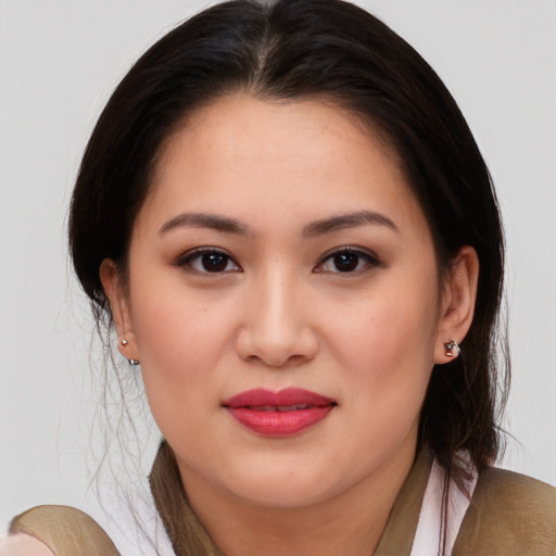 Joyful white young-adult female with medium  brown hair and brown eyes