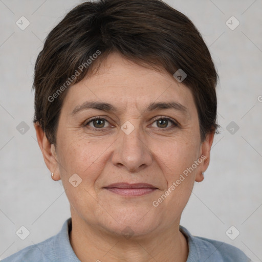 Joyful white adult female with short  brown hair and brown eyes