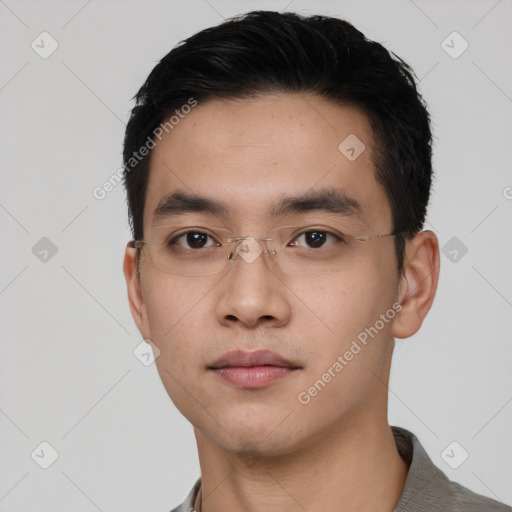 Neutral asian young-adult male with short  black hair and brown eyes