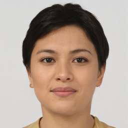 Joyful asian young-adult female with short  brown hair and brown eyes