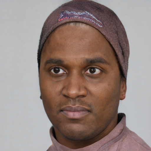 Neutral black young-adult male with short  brown hair and brown eyes