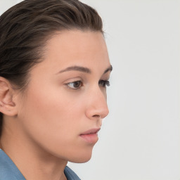 Neutral white young-adult female with short  brown hair and brown eyes