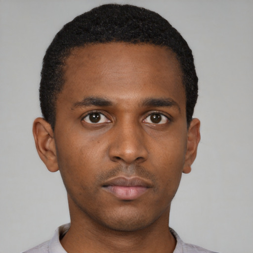 Neutral black young-adult male with short  brown hair and brown eyes